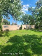 3-bedroom, 1-bathroom home on a spacious, tree-filled lot