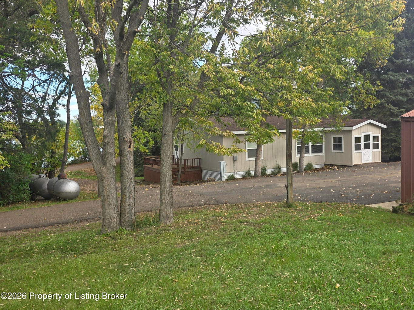 Peaceful Lakeside Living on 1.5 Acres